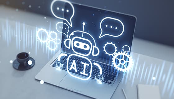 笔记本电脑桌上的全息AI机器人图片素材(JPG)