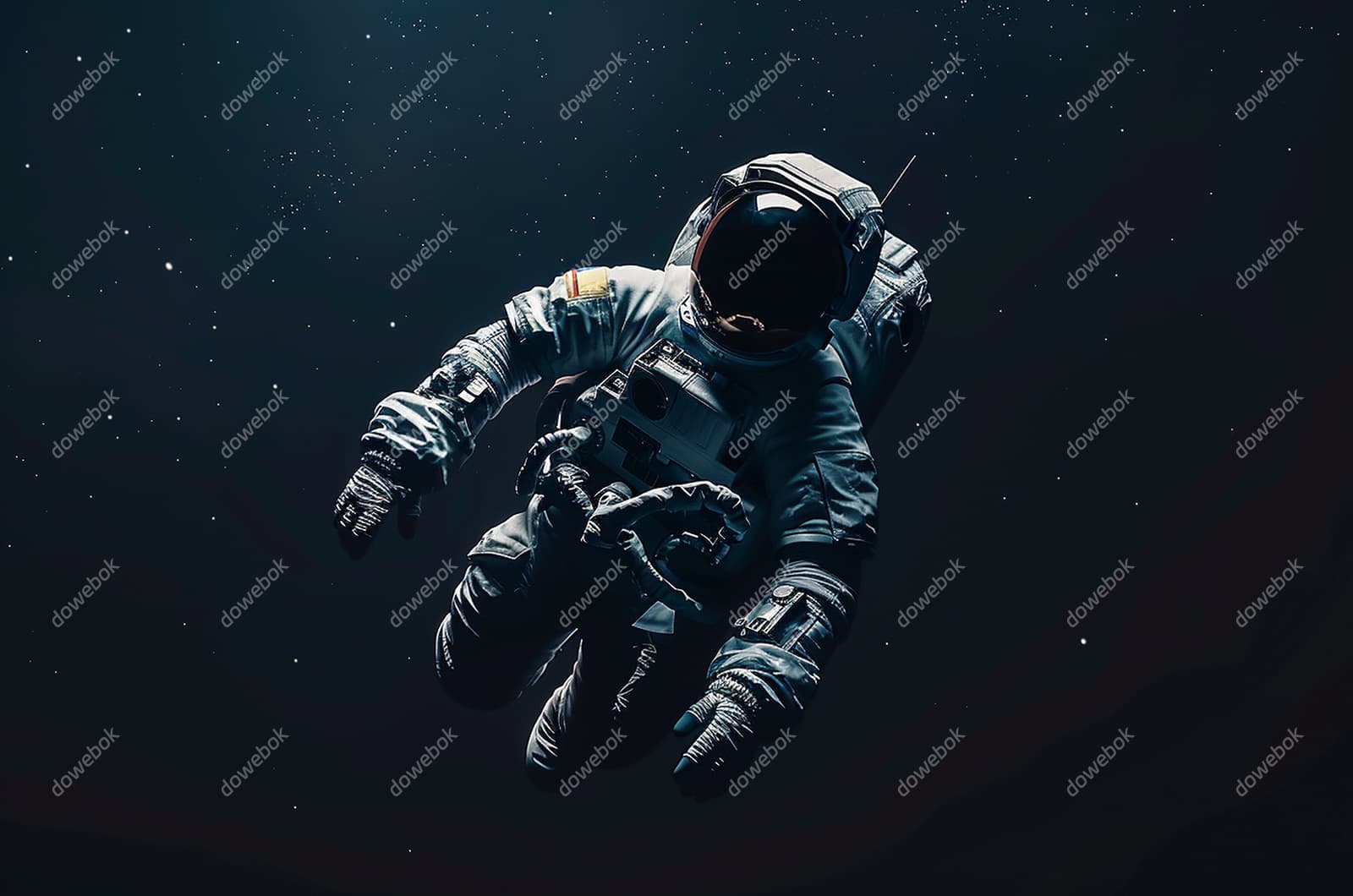 漂浮在浩瀚无垠的宇宙中的宇航员图片素材(JPG)